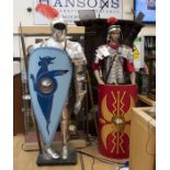 A pair of reproduction suits of armour both on mannekins, height approx. 200cm and 205cm. (2)