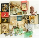 A large collection of costume jewellery and watches to include a 9ct gold charm bracelet with