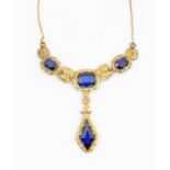 An early 20th century continental, possibly French, synthetic sapphire and gold necklet,