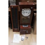 A National Time Recorder Co Ltd wall hanging clocking in clock, with property of Rolls Royce plaque,