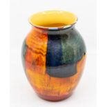 A multicoloured Poole vase, circa 1970's retro, signed below by the painter