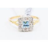 An aquamarine and diamond 18ct gold ring, comprising a square cut aquamarine approx. 0.30ct,