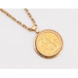 A George V sovereign dated 1914 mounted in a 9ct gold pendant mount on a fancy link  chain with