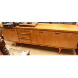 1970s teak long sideboard with three cupboard doors and three drawers