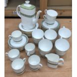 An incomplete Royal Doulton 'Rondelay' pattern tea and coffee set comprising:- a coffee jug, 12