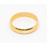 A 9ct gold band, D shaped width approx. 5mm, size X, with millennium hallmark, weight approx. 3.4gms