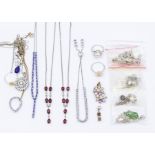 A collection of silver jewellery comprising silver and gem set jewellery, to include a tanzanite set
