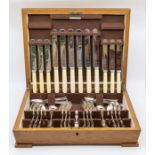 A 1940's William Hutton of Sheffield six piece plated canteen of cutlery in oak Art Deco box