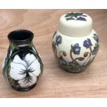A small Moorcroft vase dated 2003 and a spice jar dated 1999 (2)