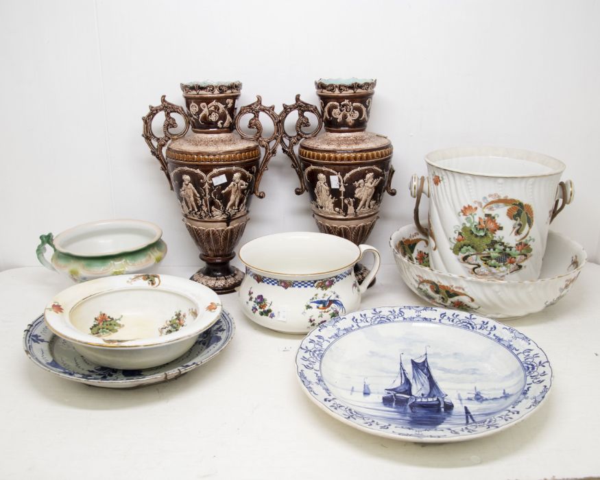 A collection of ceramics to include: a Royal Bonn "Delft" charger painted with boats and