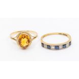 A 9ct gold and citrine ring, set with an oval citrine within a rope border, size R, total gross