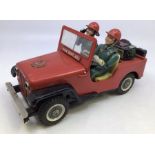 A boxed tinplate battery operated toy fire command car  made by Nomura (T.N.) of Japan. In