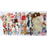 Dolls: A collection of assorted modern plastic dolls, in a variety of sizes and dress, condition