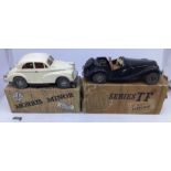 Victory Industries battery operated Morris Minor in reproduction box and MG TF in original damaged