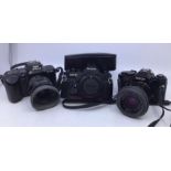 Cameras: two Ricoh KR-10 cameras, and Nikon F-401s, along with lenses and flash unit.