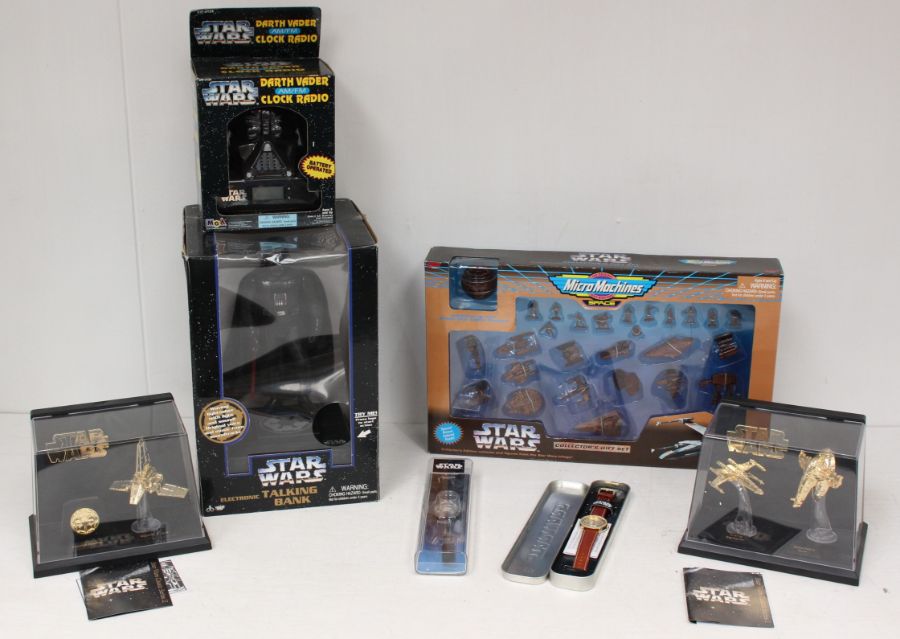 Star Wars: A boxed Star Wars Darth Vader Electronic Talking Bank; together with a boxed Darth