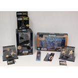 Star Wars: A boxed Star Wars Darth Vader Electronic Talking Bank; together with a boxed Darth