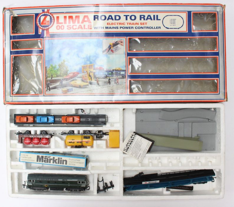 Model Railway: A pair of boxed Lima OO gauge train sets, unchecked for completeness and in correct