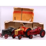 ERTL: A collection of three boxed ERTL Tractors to comprise: Case L Tractor, Case 600 Tractor and