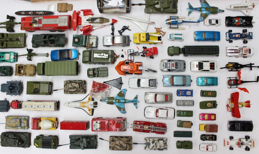 Diecast: A collection of assorted playworn diecast vehicles to include: Dinky, Corgi, Matchbox and
