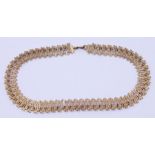 A 1970s textured 9ct gold Choker