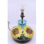 A Moorcroft lamp, "sunflower". H:40cm Condition: Good
