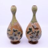 A pair of Doulton slaters patent vases