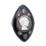 A late 18th/early 19th century diamond and enamel navette shaped ring, centred with a circular shell