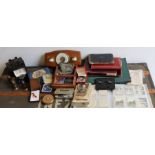 A large collection of miscellaneous items to include albums, costume jewellery, coins, watches and