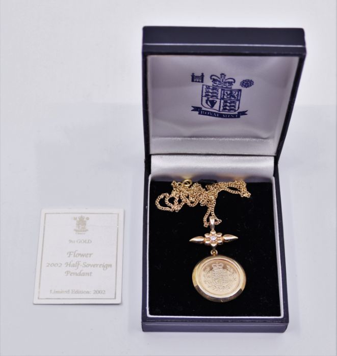 A Royal Mint classics half sovereign pendant in a 9ct mount, limited edition 2002, in box.