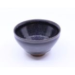 A high fired Chinese bowl, H; 7cm, diameter: 13cm