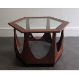 A 20th century octagonal coffee table, in the manner of G-plan, height 42cm x max. width 53cm.