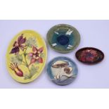 Three Moorcroft plates and a Moorcroft saucer (no cup)  Condition: Good