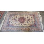 A fine quality part silk Qum rug, 147cm by 222cm signed