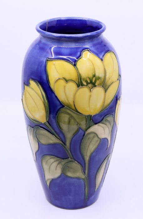 A Moorcroft "buttercup" vase, H: 26cm Condition: Good