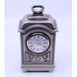 A pewter mantle clock, inscribed To Betty Boothroyd from NOAB 1999 Property of Baroness Boothroyd