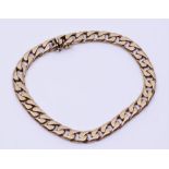 A 9ct gold Curb link bracelet marked 375