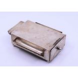 An unusual l oversized silver cigarette box with drawer