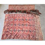 A Tek rug and similar camel bag