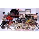 A collection of costume jewellery to include silver and yellow metal bracelets