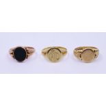 Two 18ct gold gents signet rings and a 9ct bloodstone set signet ring