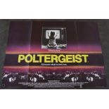 A movie poster 'Poltergeist' (1982)