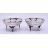 A pair of silver reticulated Edwardian baskets