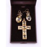 A yellow metal crucifix set citroine and associated pair of drop earrings, each set oval faceted