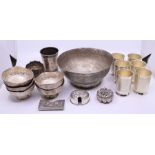 A collection of white metal items