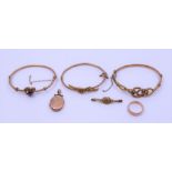 A 9ct rose gold knot bracelet, similar gold bracelets and a 9ct wedding band etc total weight 24.5