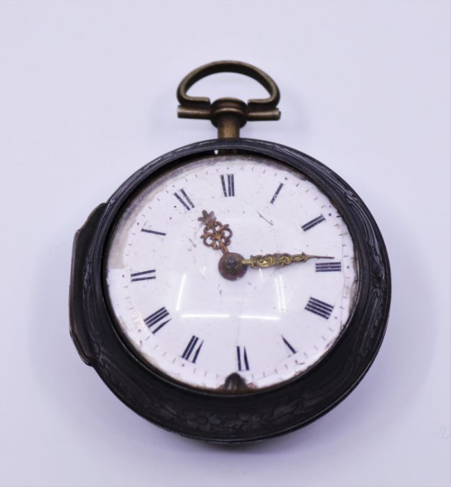 A late 18th century/ early 19th century pair cased pocket watch with enamel dial, Roman numerals