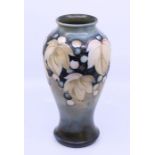 A Moorcroft pink and gray vase, number 5, H:19cm Condition: Good