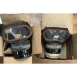 Two WW2 gas masks in Original Boxes one 1938 the other 1939.