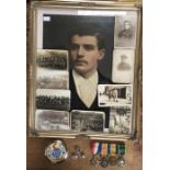 WW1 British medal group with oil on board painting of R. Armstrong and postcards showing him in